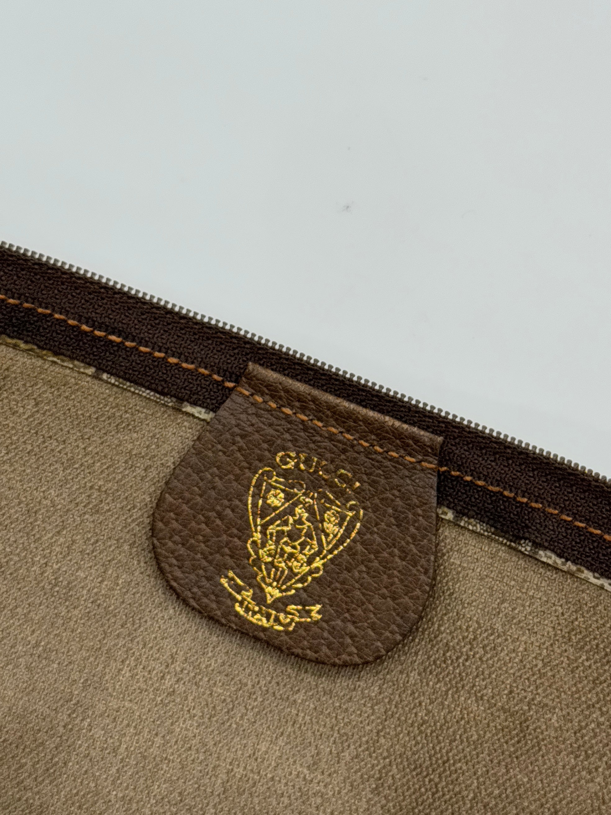 Gucci Supreme Clutch