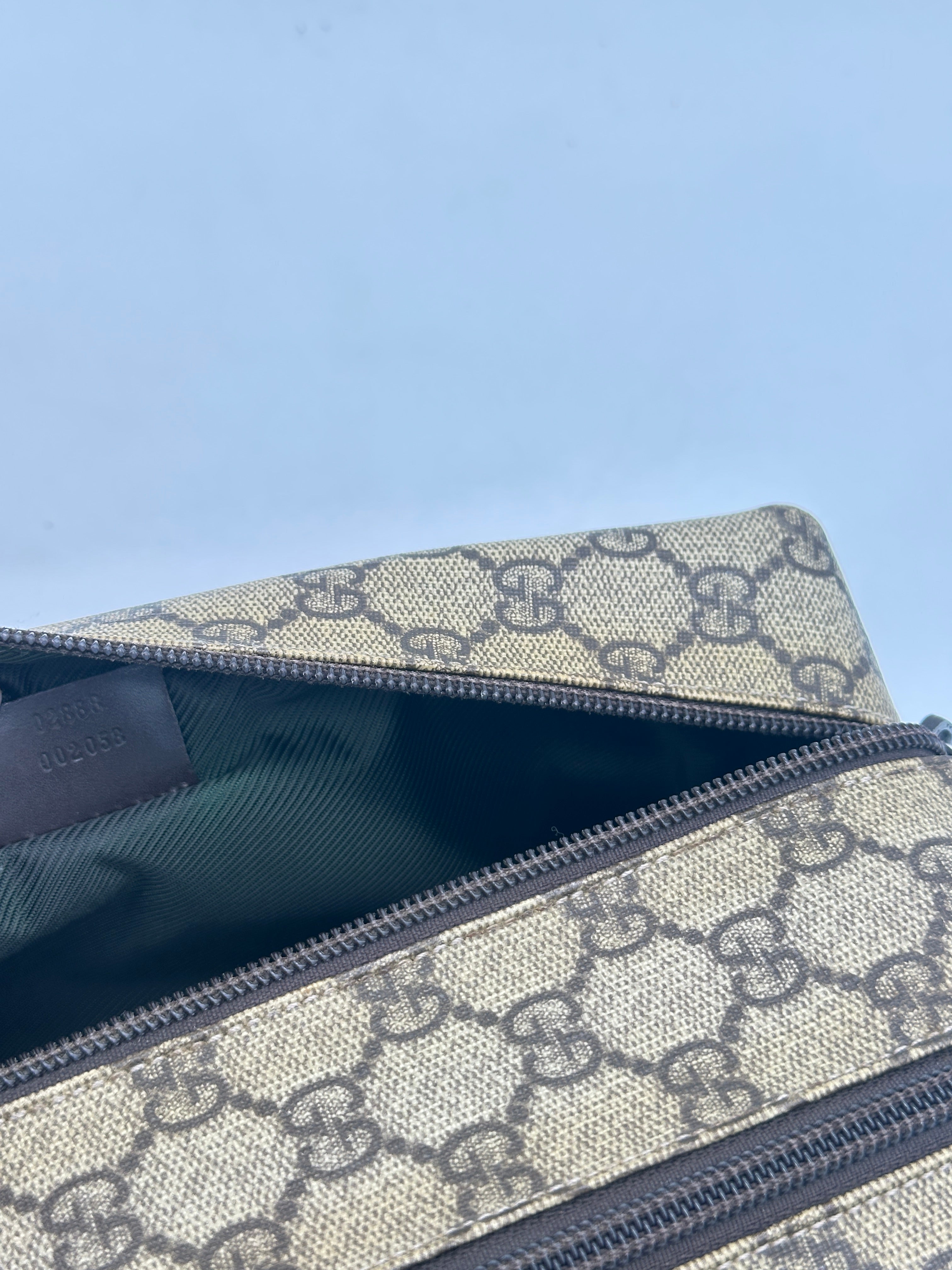 Gucci Supreme Pouch