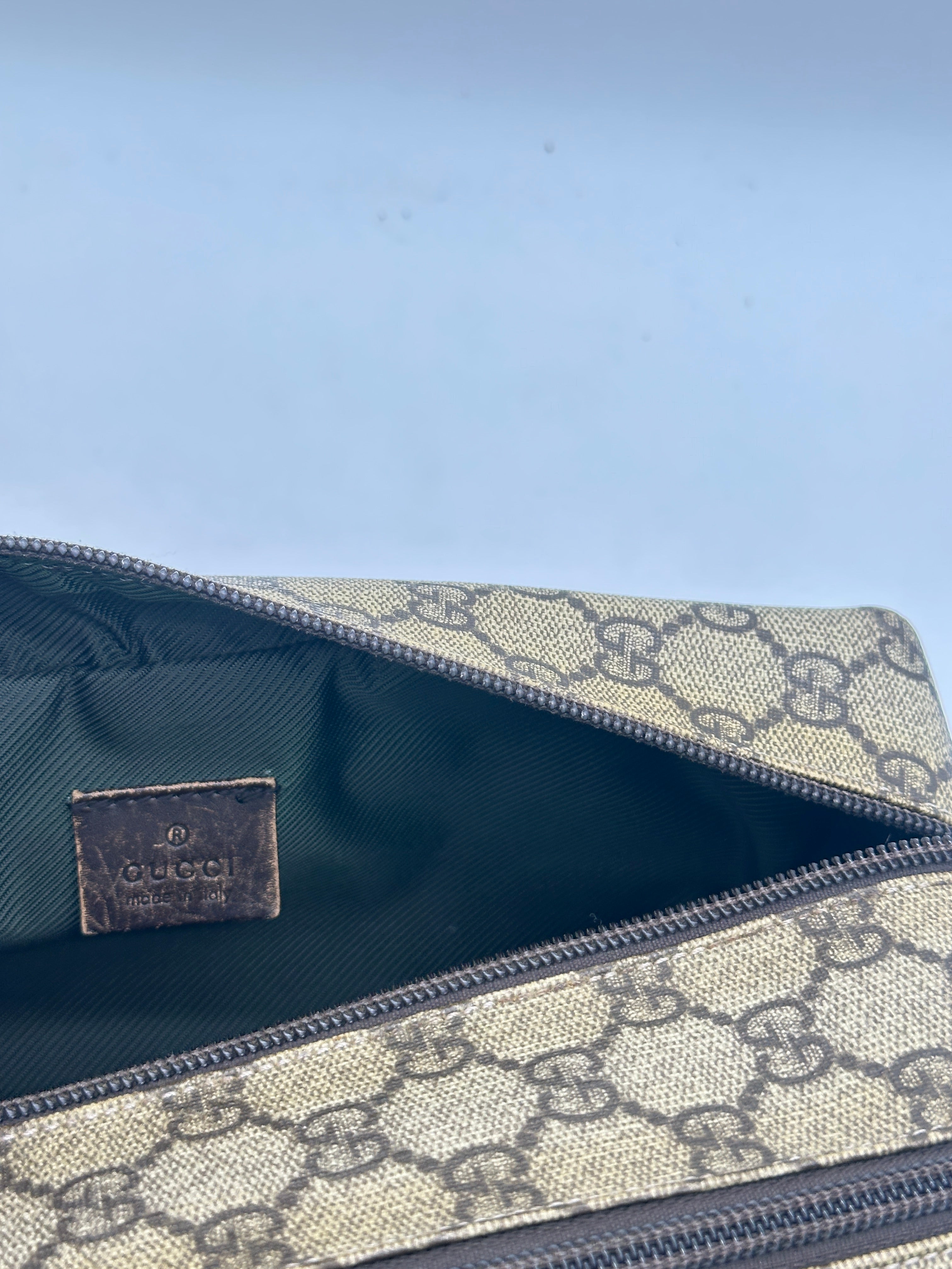 Gucci Supreme Pouch