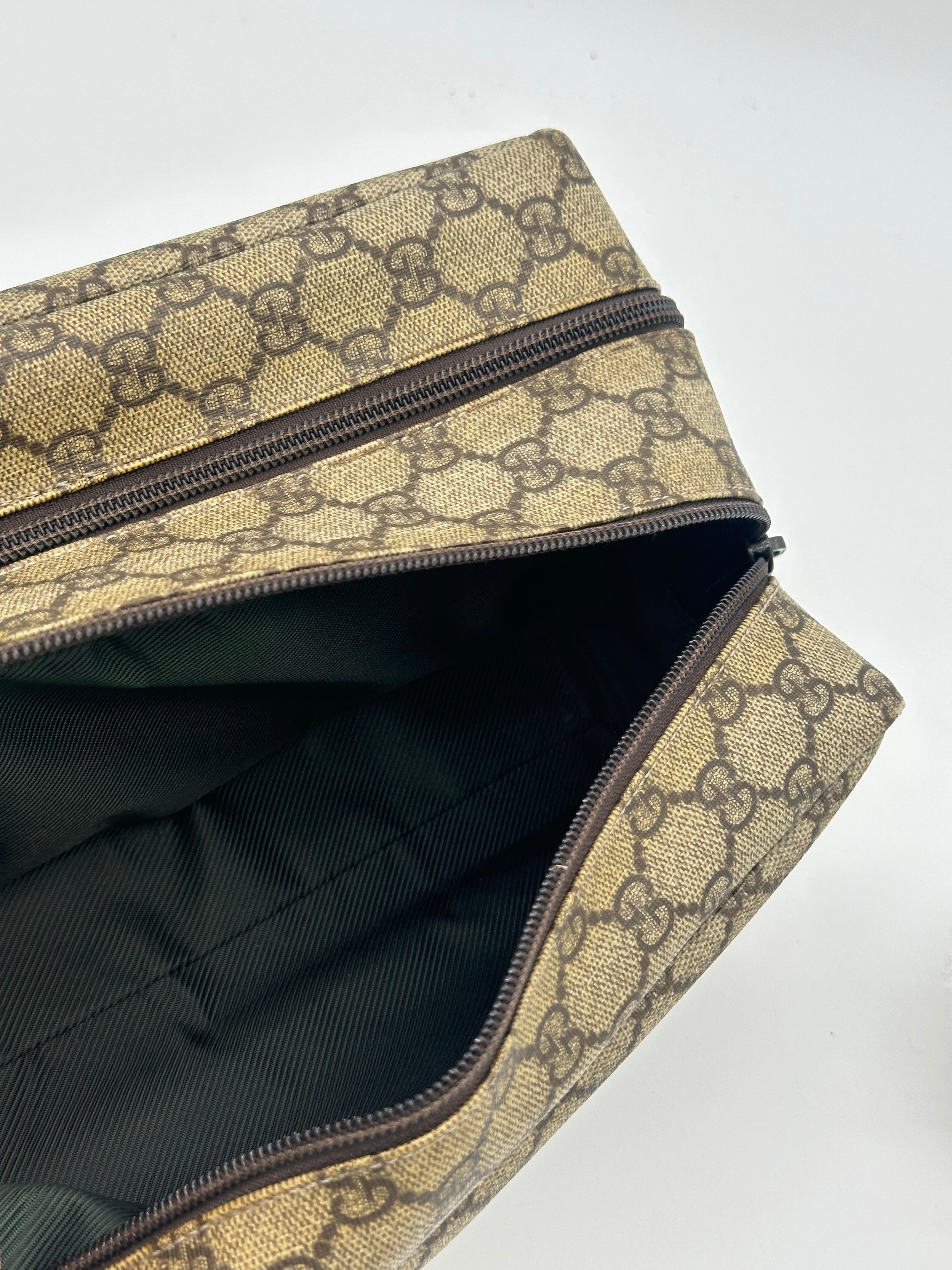 Gucci Supreme Pouch