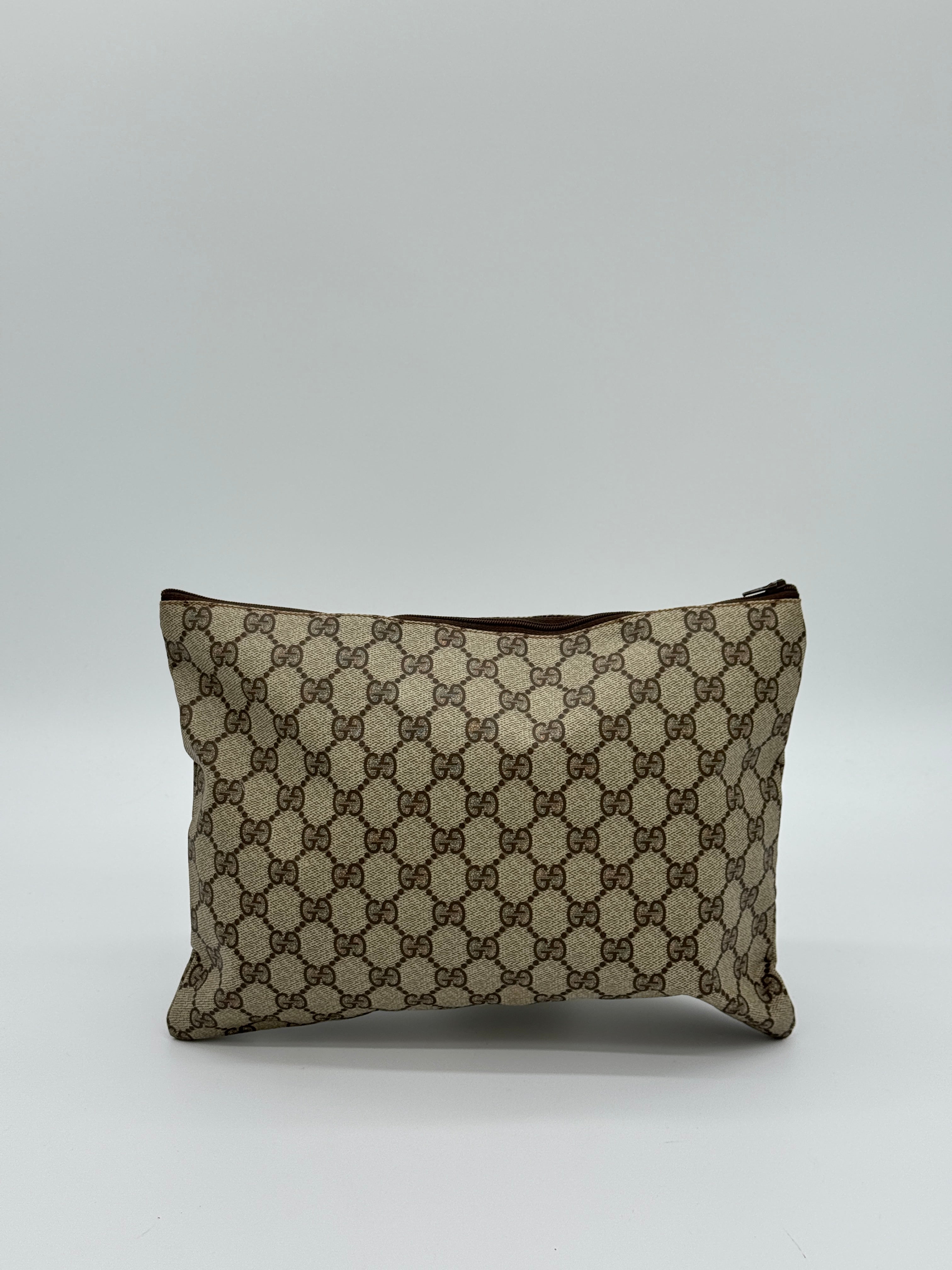 Gucci Supreme Clutch