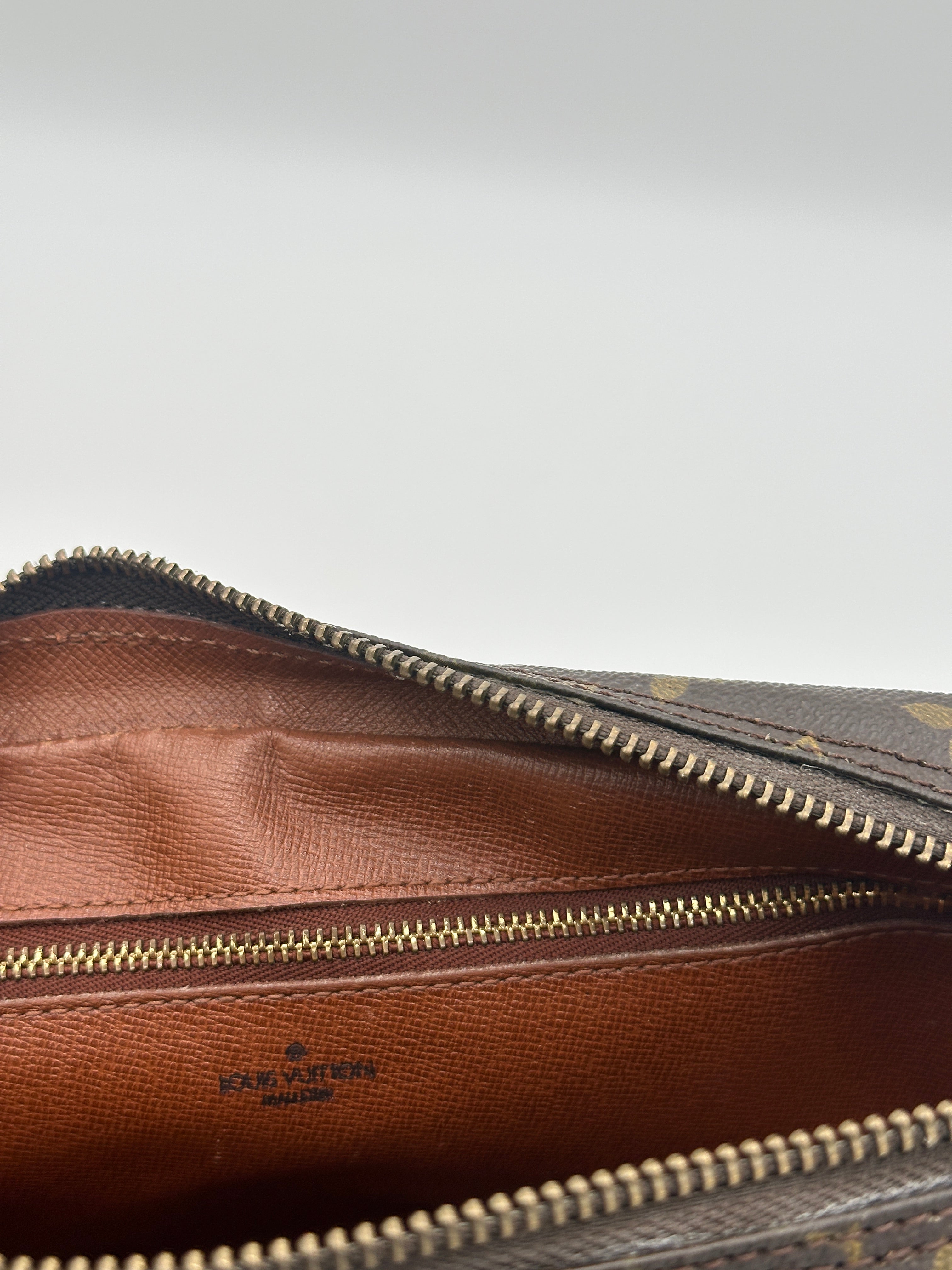 Pre-loved Louis Vuitton Jeune Fille GM | Pepper Luxury Vintage