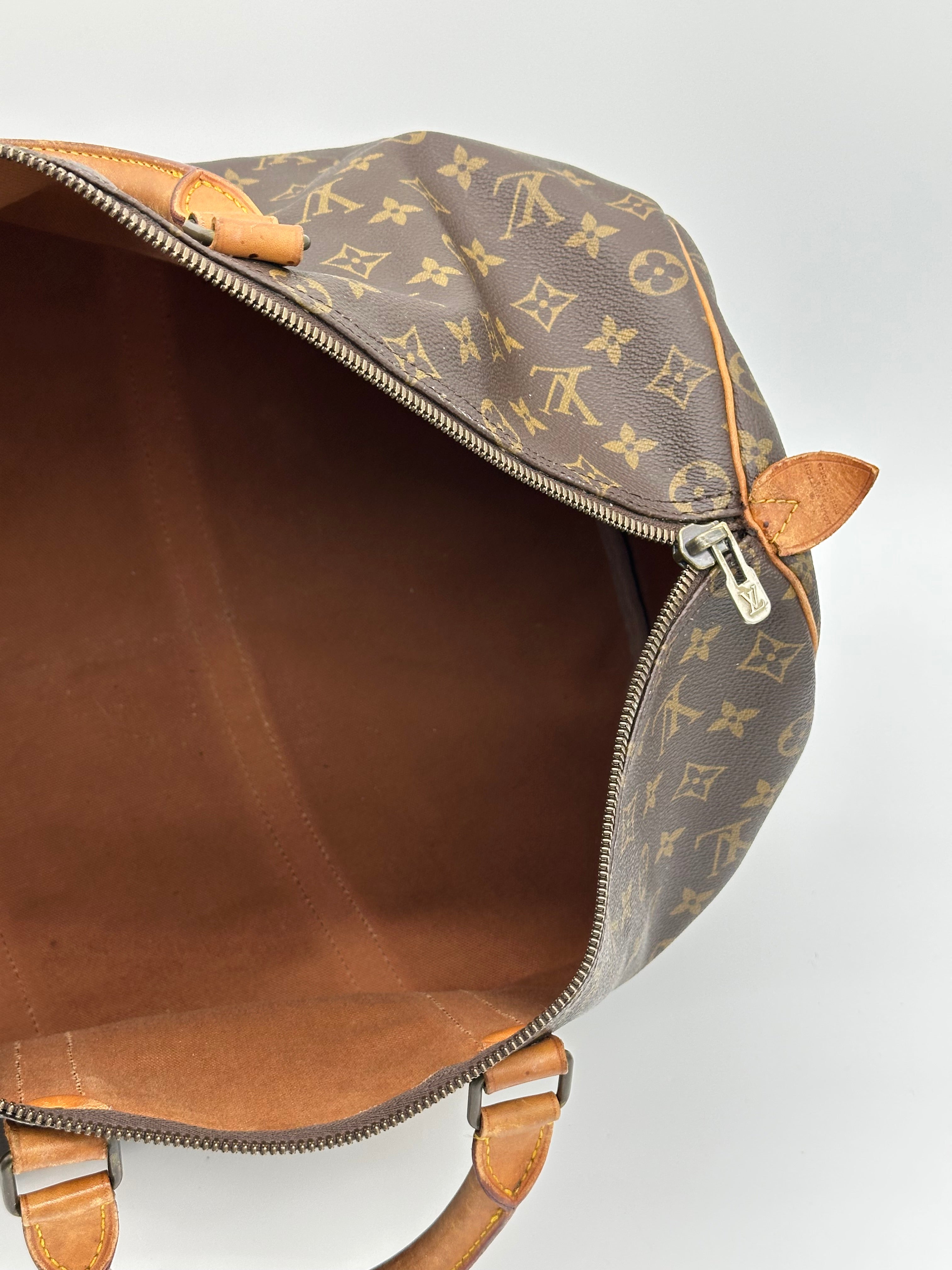 Pre-loved Louis Vuitton Keepall 50 | Pepper Luxury Vintage