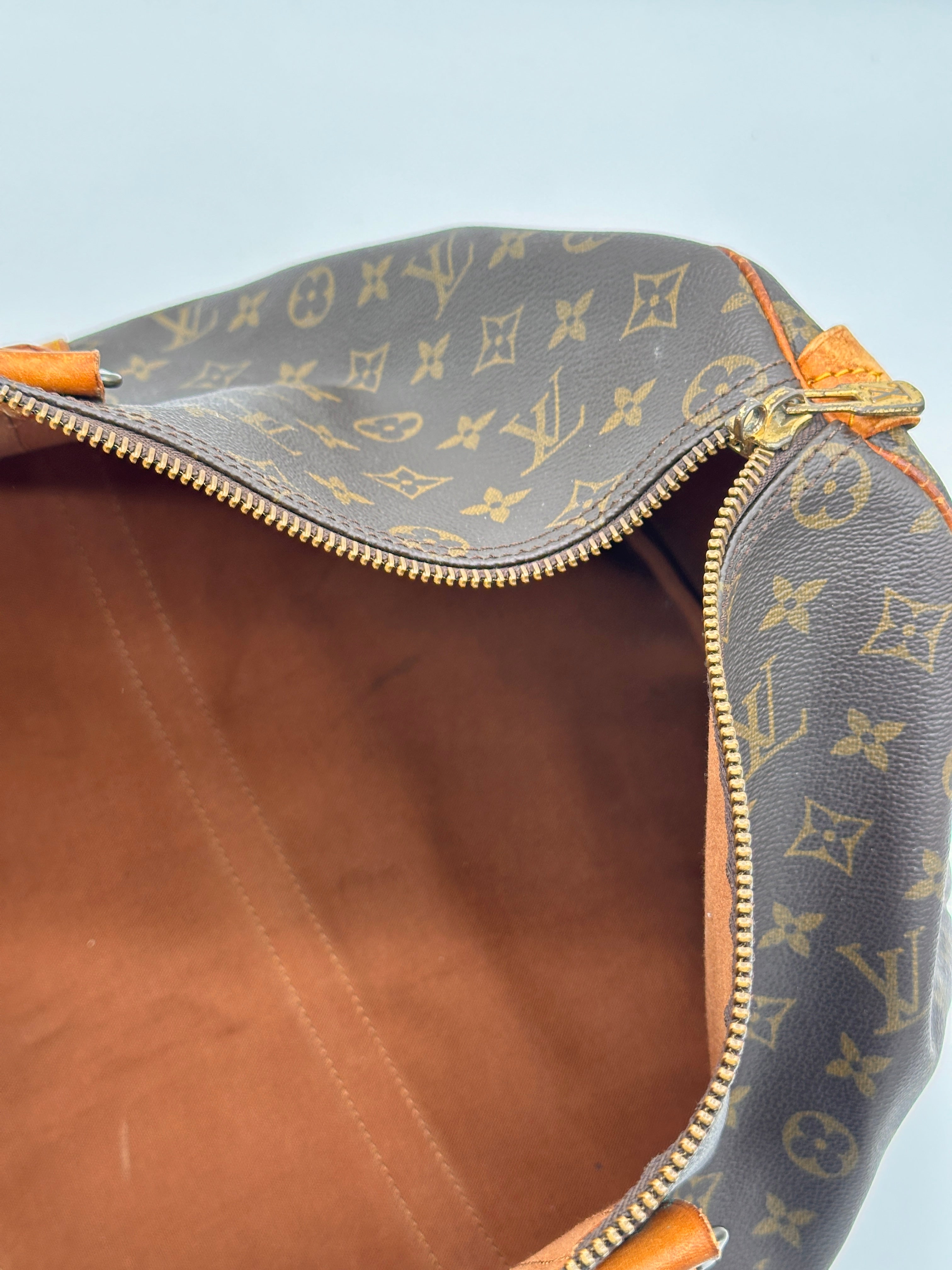 Pre-loved Louis Vuitton Keepall 50 | Pepper Luxury Vintage