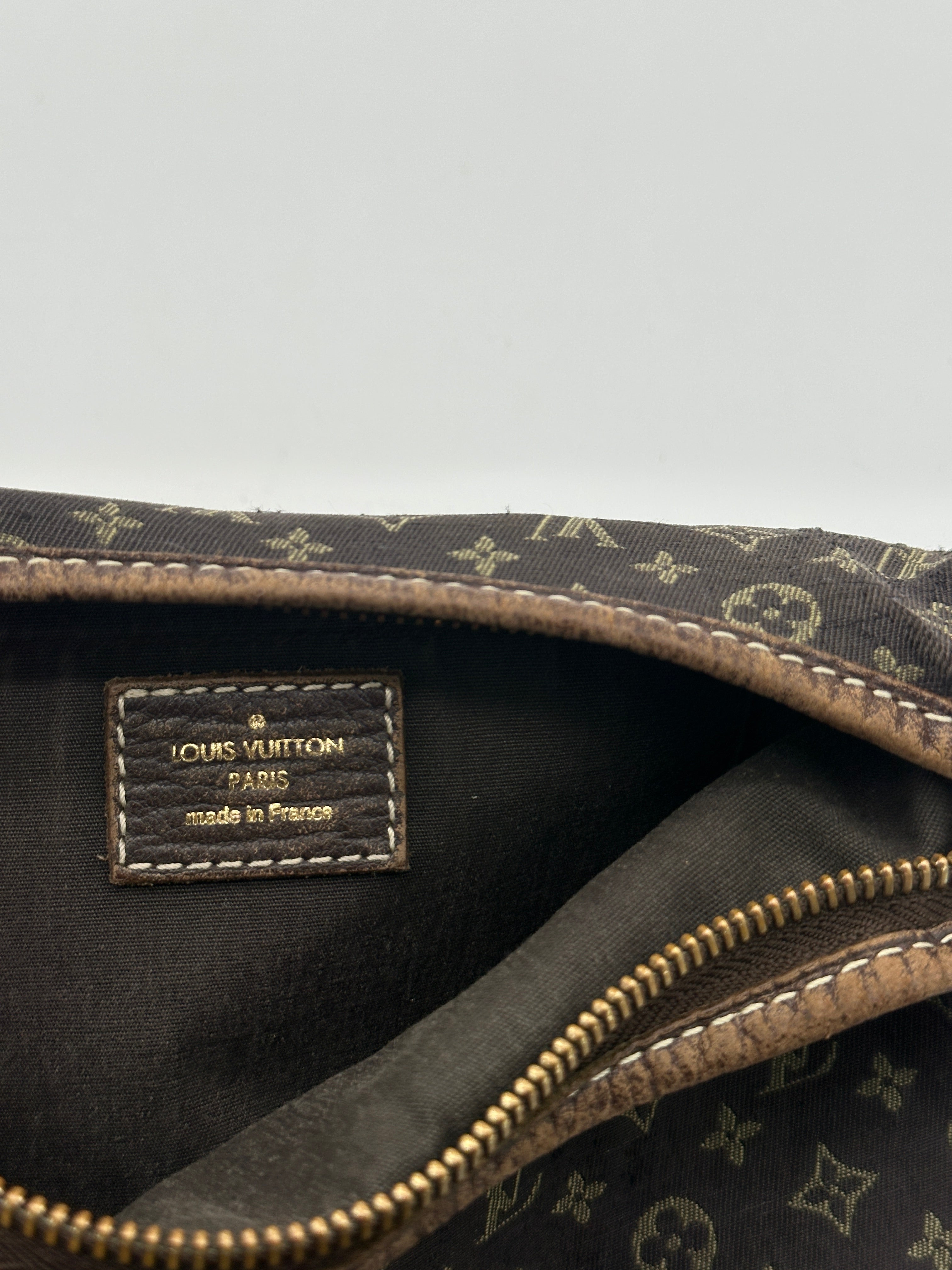 Pre-loved Louis Vuitton Mini Lin Manon PM | Pepper Luxury Vintage