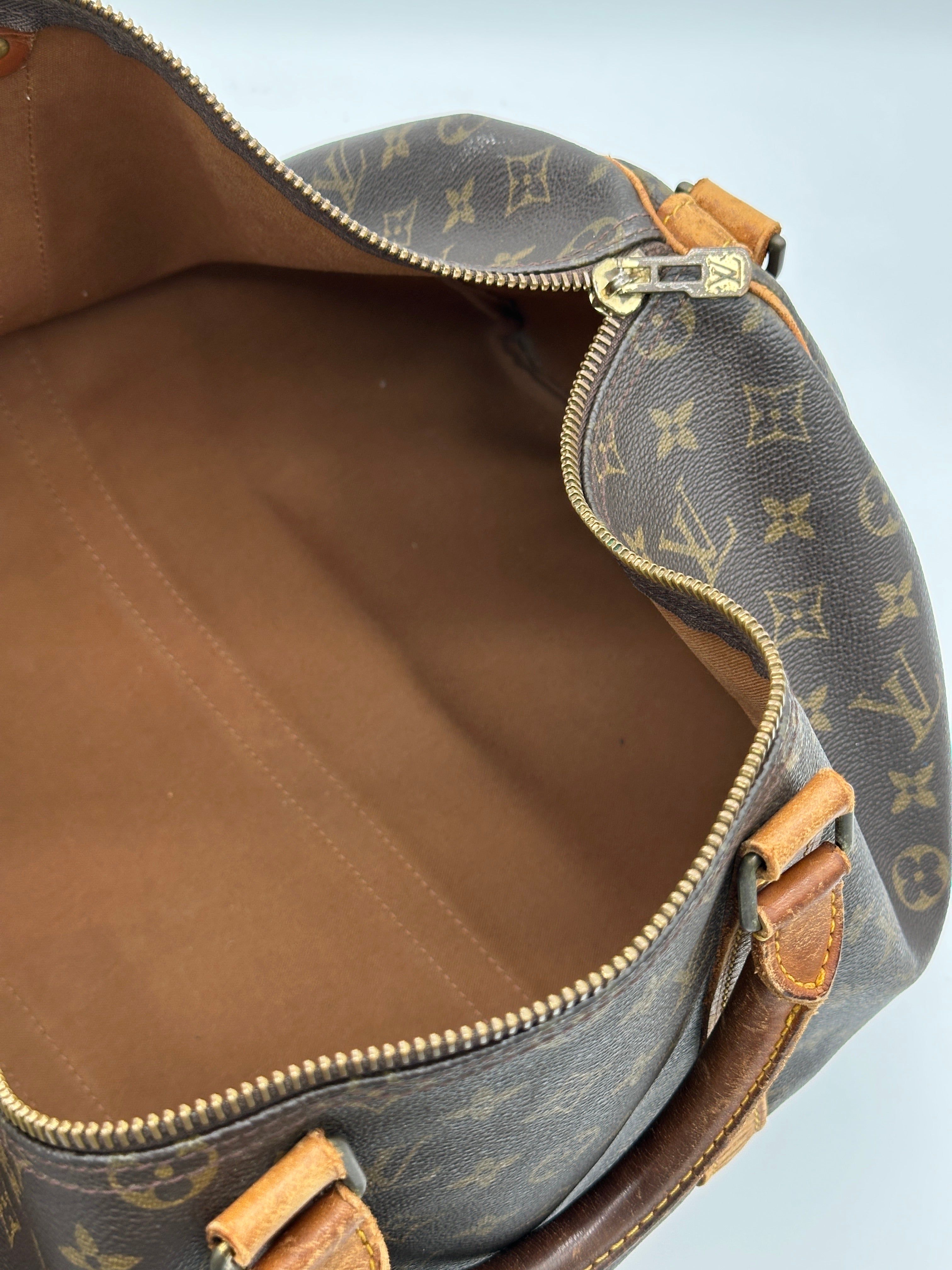 Pre-loved Louis Vuitton Keepall Bandouliere 50 | Pepper Luxury Vintage