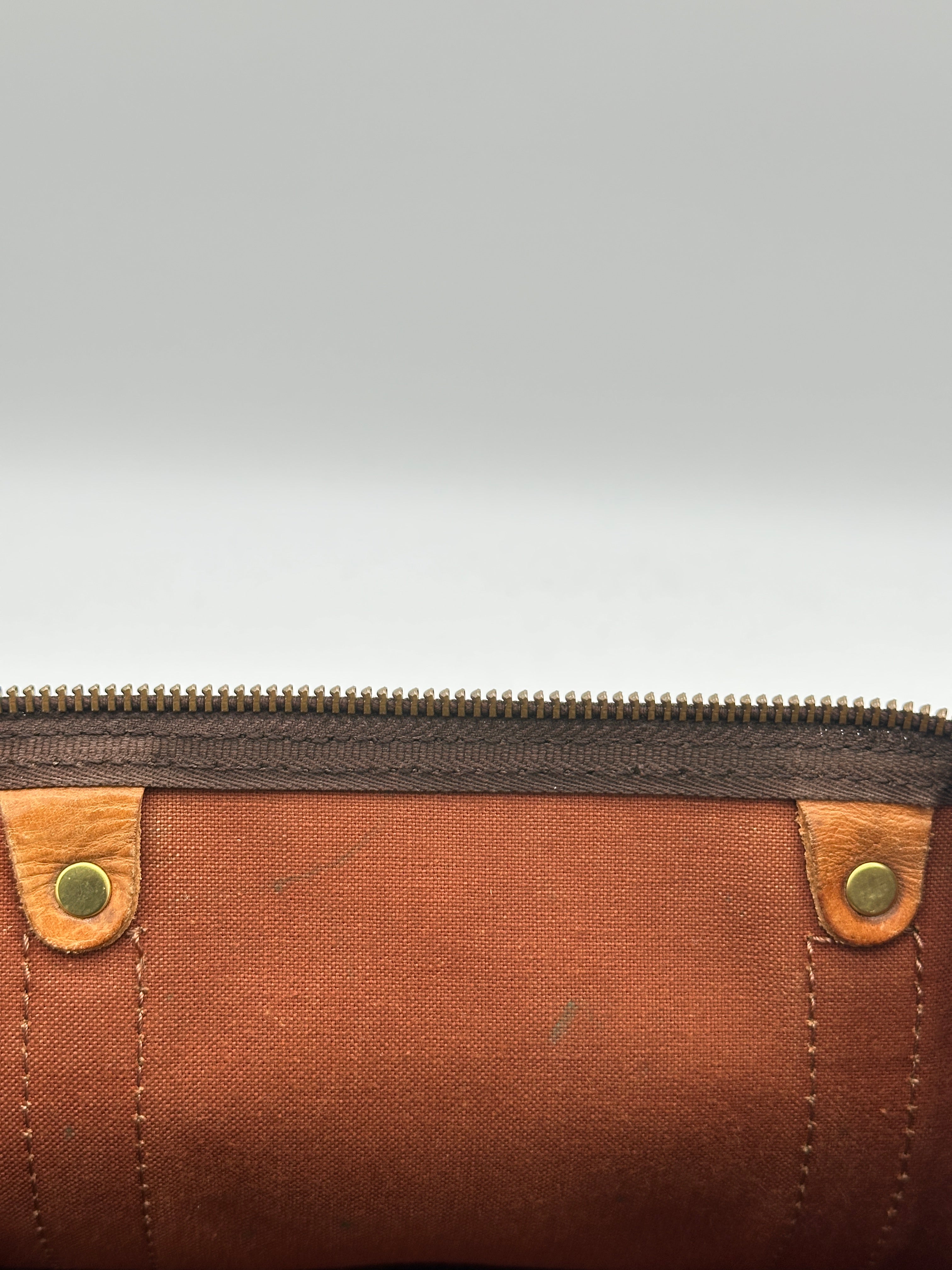 Pre-loved Louis Vuitton Keepall 50 | Pepper Luxury Vintage